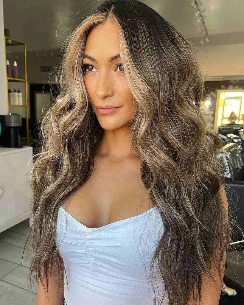 Asbruine balayage met blond geldstuk' title=