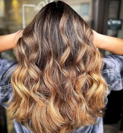 Sun-Kissed Caramel Brown Balayage for Medium to Long Tresses