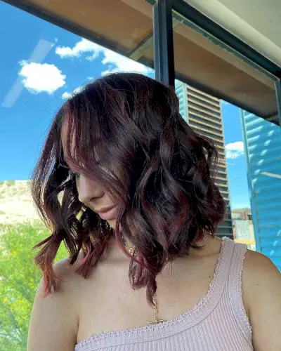 Wavy Lob with Subtle Burgundy Highlights for Dark-Haired Women