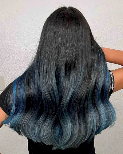 long, thick black hair with blue highlights