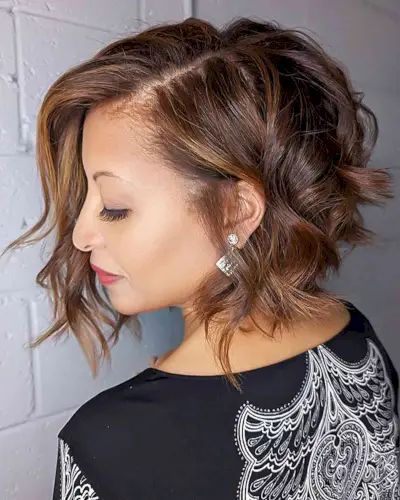 Layered Bob with Bangs with a Golden Brown Balayage