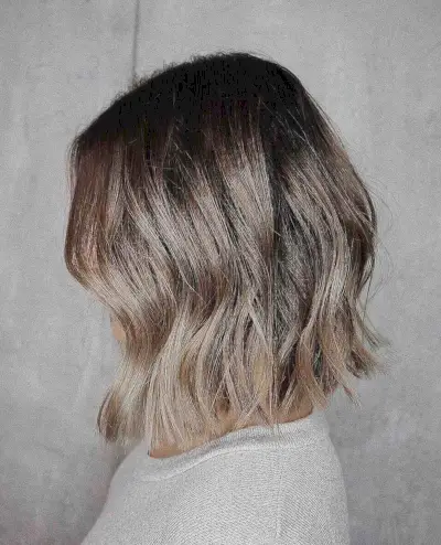 short blunt cut with honey blonde balayage highlights