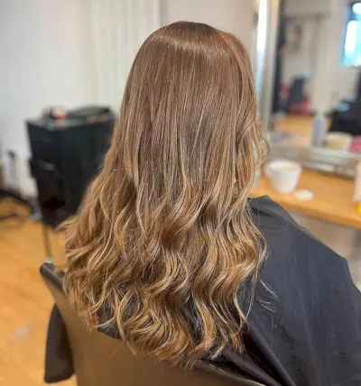 Subtle Gold Highlights on Longer Light Brown Hair