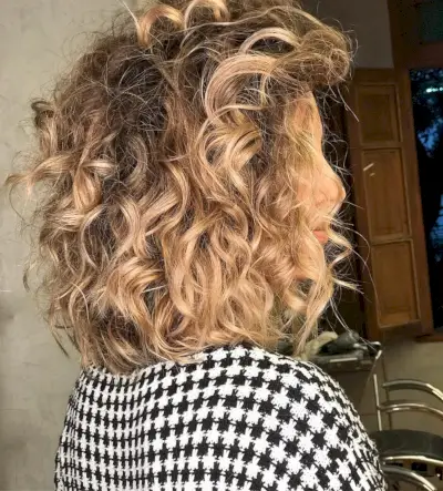 light golden brown curly hair