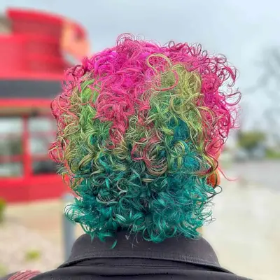Short Vivid Rainbow Curls Hair Color Ideas