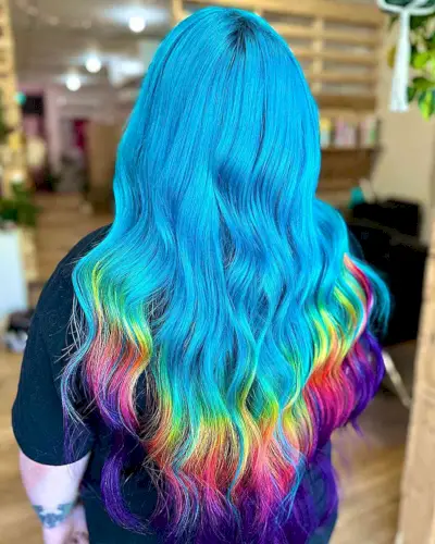 Long Blue Hair with Rainbow Tips Hair Color Idea