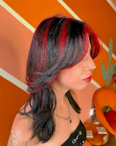 Red Chunky Highlights and Medium Feathery Layers for Black Hair