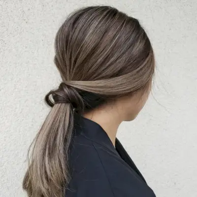 Subtle Ashy Blonde Hue for Dark Brown Hair