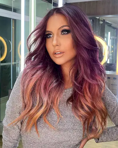Dark Violet to Light Orange Ombre hair color for women with long hair