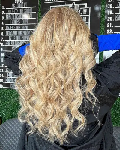 Gorgeous Long Curled Blonde Hair with Lowlights
