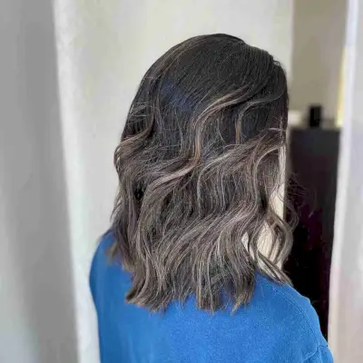 Low-Maintenance Lived-in Highlights on Dark Black Hair