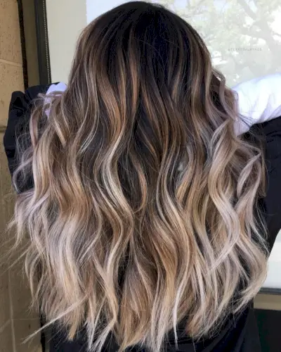 Gorgeous Black hair with blonde ombre highlights