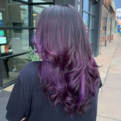 Black Hair with Vibrant Purple Highlights