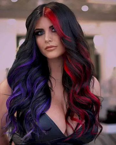 Lived-In Vivid Red and Purple Highlights on Black Hair