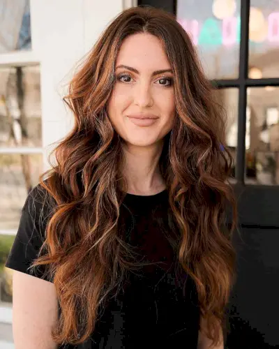 warm toasty brown balayage for long wavy hair