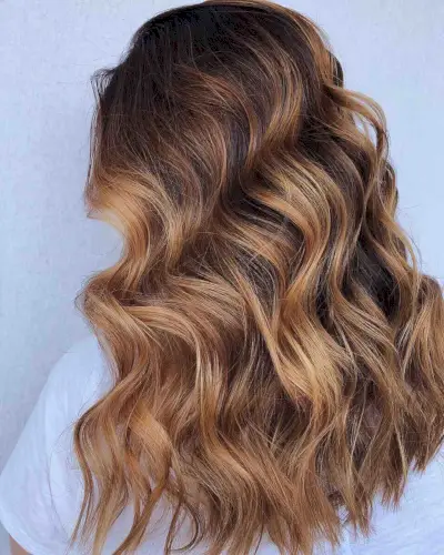 dark chocolate hair with caramel highlights