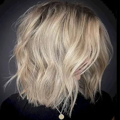 Soft Textured Buttery Blonde with Dark roots and for women with messy hair