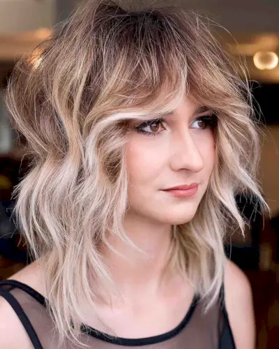 ash blonde with brown roots