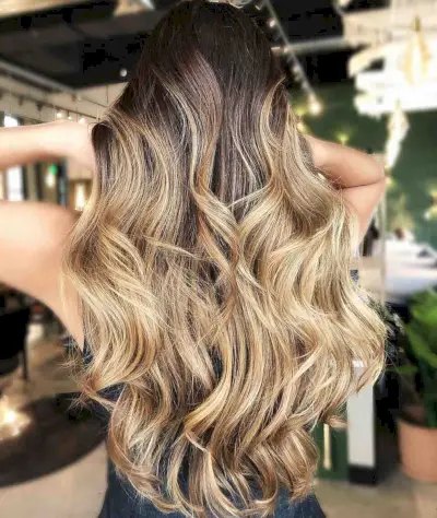 dark roots on sun-kissed blonde hair