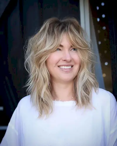 dirty blonde with natural dark roots