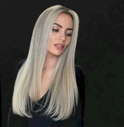 platinum blonde hair with naturally dark roots