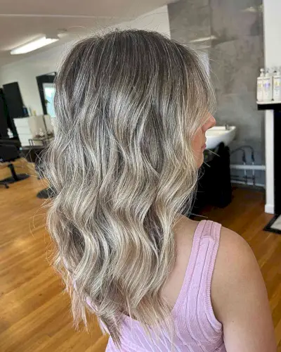 Dark Base with Ashy Dirty Blonde Balayage Tones for Layered Mid-Length Cut