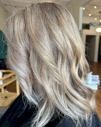 Medium-Length Dirty Vanilla Blonde Balayage with Subtle Layers