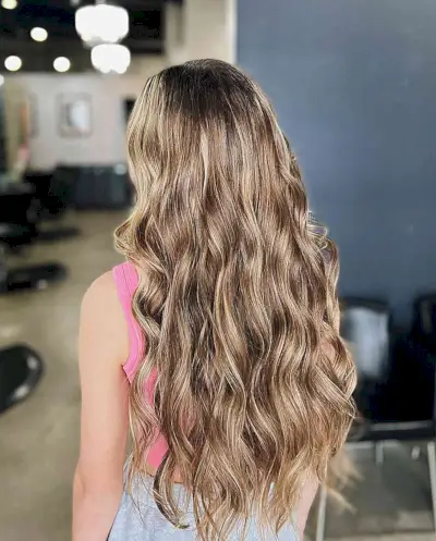 Waist-Length Soft Dirty Blonde Balayage Highlights for Wavy Brunette Hair