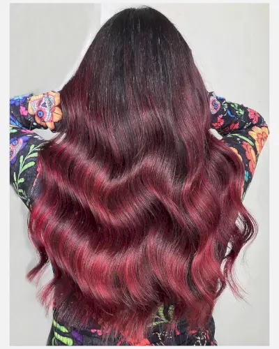 dark magenta balayage on black hair