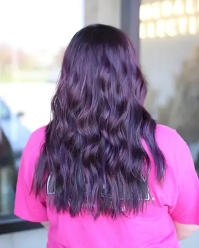 Deep sea aubergine on beach waves