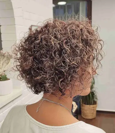 Short Curly Brown Hair with Balayage