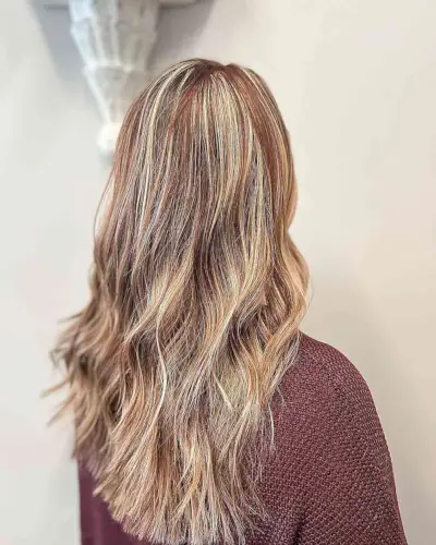 Red highlights on dirty blonde hair