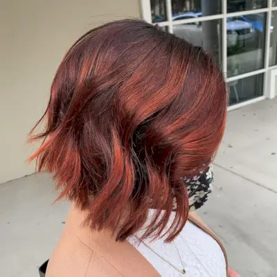 Bright red highlights on short hair