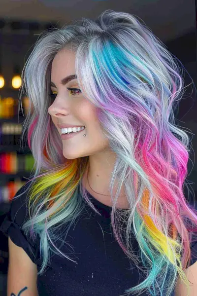 Long silver-based hair with layered waves featuring rainbow colors