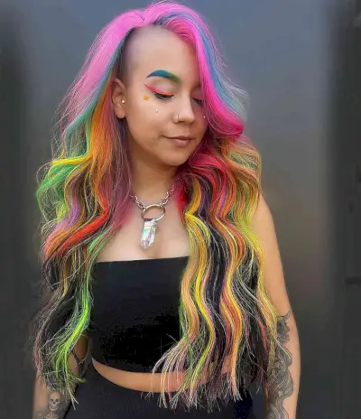 Flawless Rainbow Hair with perfectly placed colors for ladies with long hair