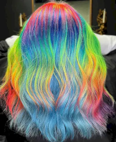 Long Neon Rainbow Hair Color on ladies with a cool style