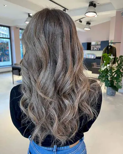 Soft Creamy Dark Bronde Balayage Highlights on Long Wavy Hair