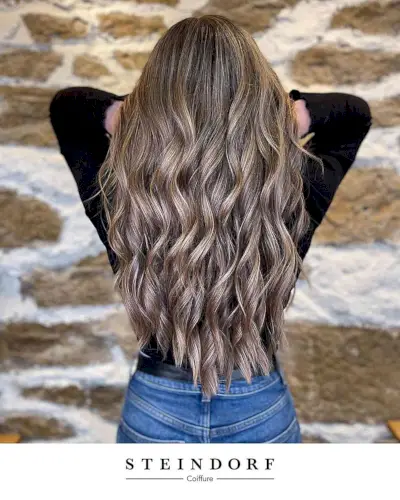 Dark Ashy Blonde Balayage on Waist-Length Wavy Brown Hair