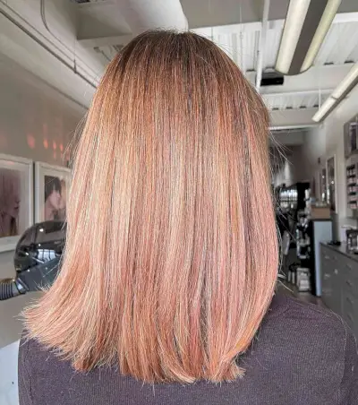 Medium-Length Copper Peach Balayage Hair with Shadow Root