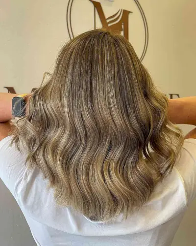 Medium Layered U-Cut with Subtle Honey Balayage Tones