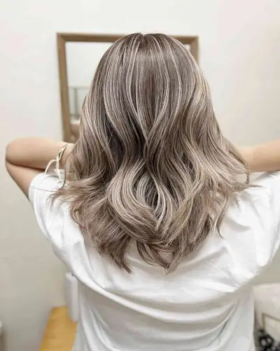 Light Ash Blonde Balayage on Medium V-Cut Layered Hair