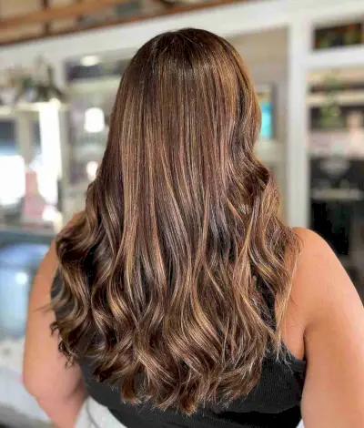 Caramel Balayage on Brown Hair with Curled Ends