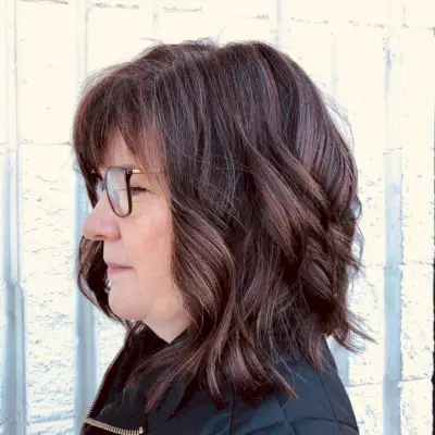 Brown hair with hints of aubutn for older women