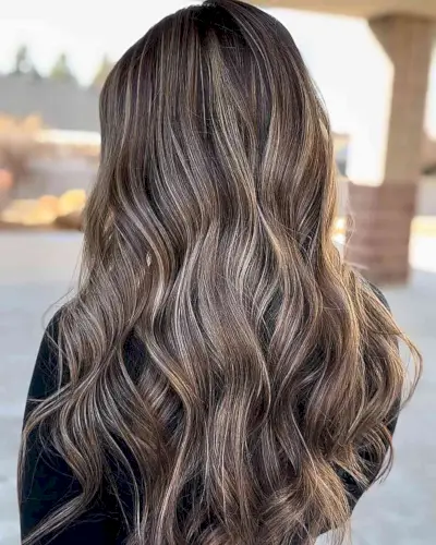Bronde Balayage Macchiato with Subtle Highlights on Long Brown Wavy Locks