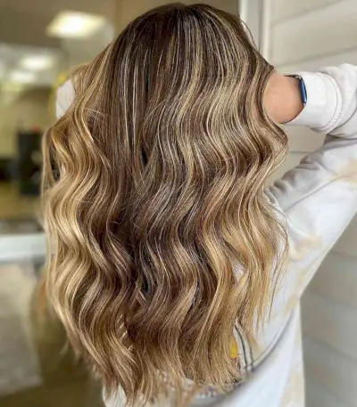 Golden Brown and Blonde Balayage Hair with Long Soft Waves