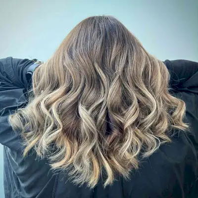 Pearl Blonde Accents for Dark Brunette Balayage Hair with Medium Choppy Layers