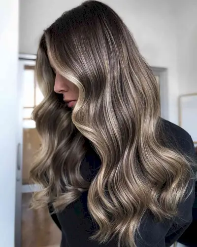 Reverse Platinum Balayage and Face-Framing Highlights on Long Dark Tresses