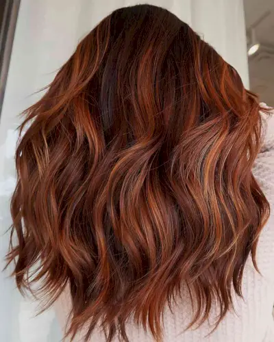 High Contrast Red Balayage Hair for women with thick mid-length hair