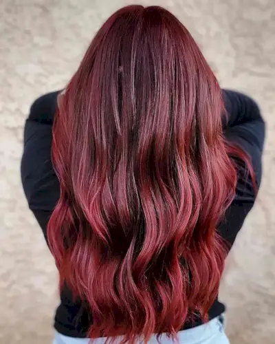 Alluring Red Balayage on Black Hair for women with long hair