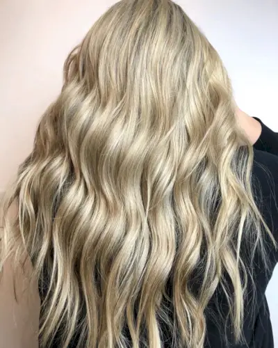 Trendy medium beige blonde hair color
